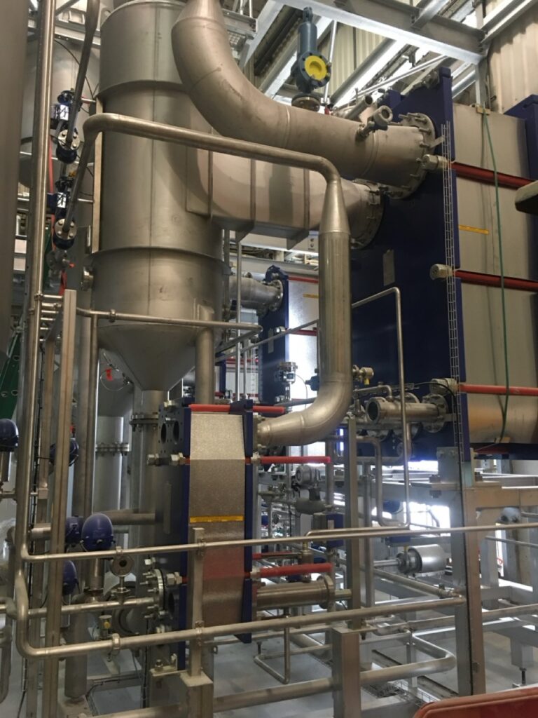 Large stainless steel process pipework installation in food production facility